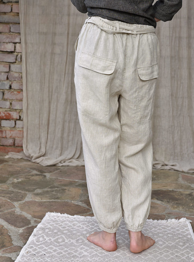 Lniane szerokie spodnie ze ściągaczami i z dużymi kieszeniami