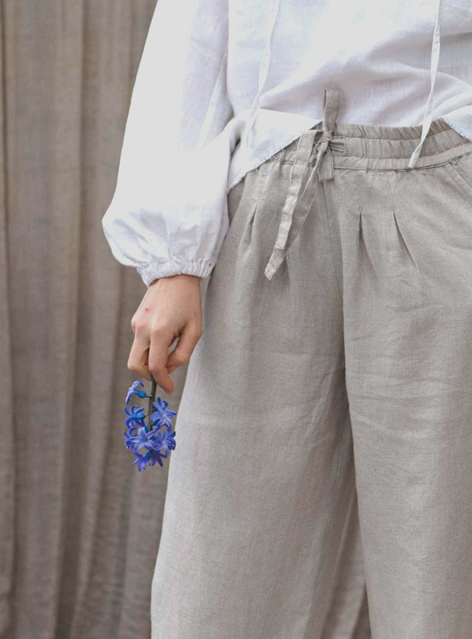 Lniane spodnie damskie beżowe o luźnym kroju